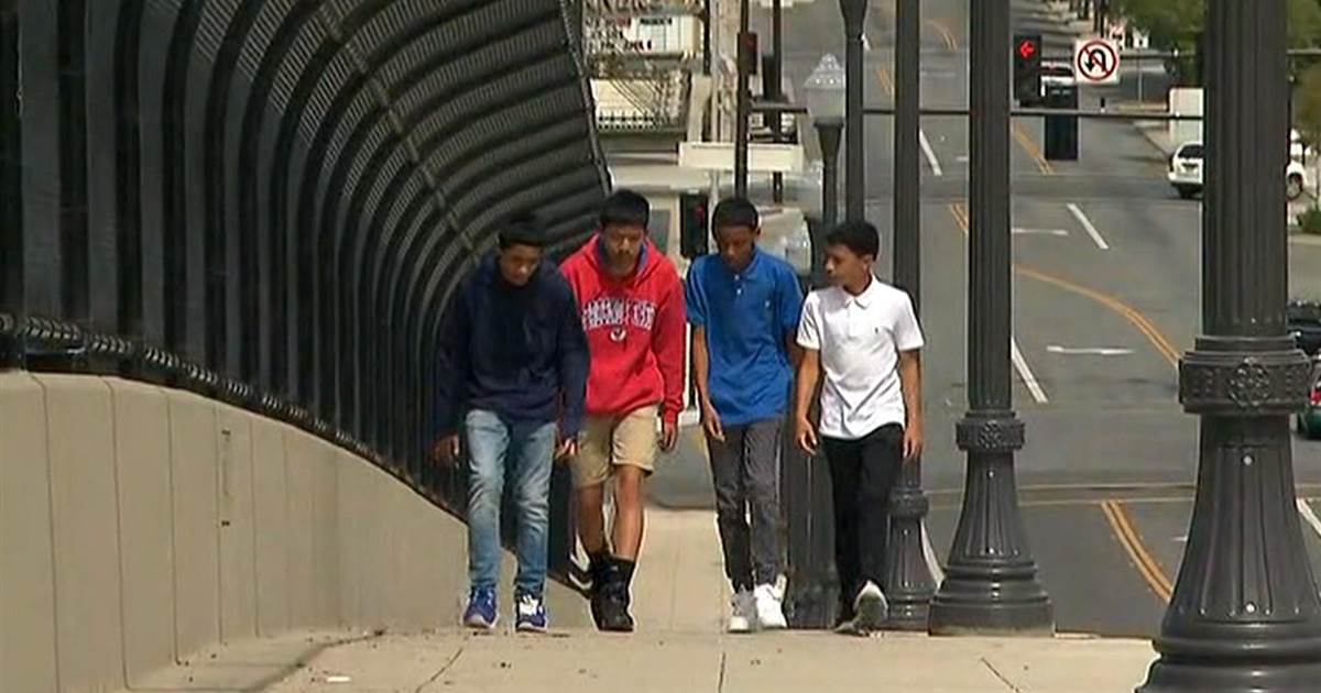 Middle school students stop woman from jumping off bridge