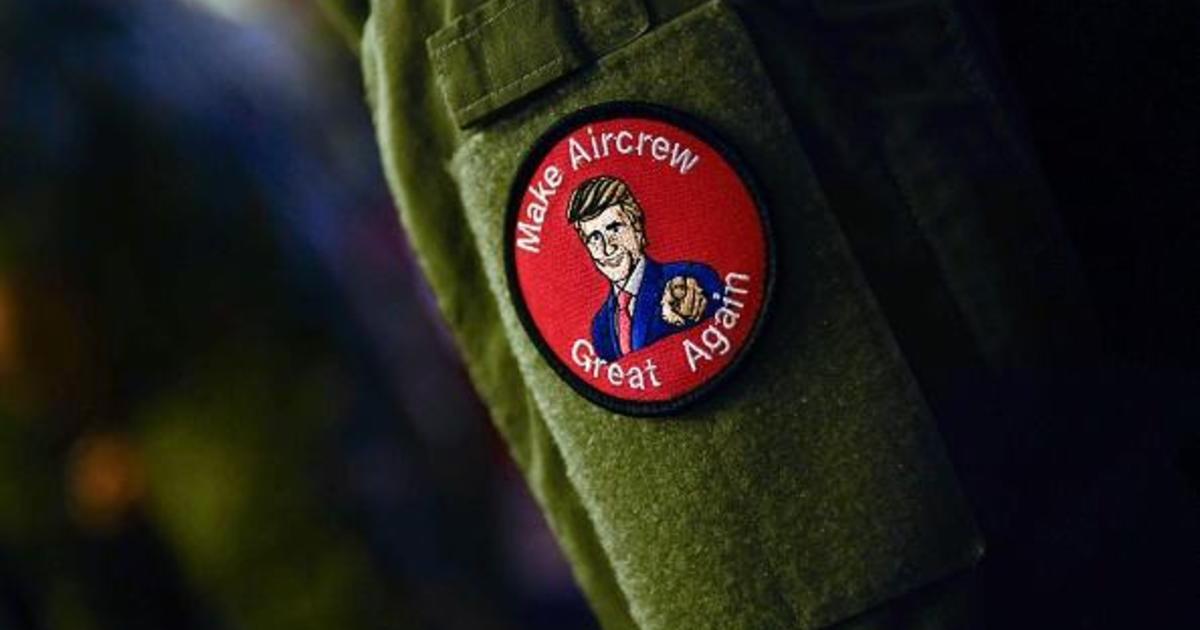 U.S. service members seen wearing MAGA-inspired patches at Trump speech may have violated DOD rules - CBS News