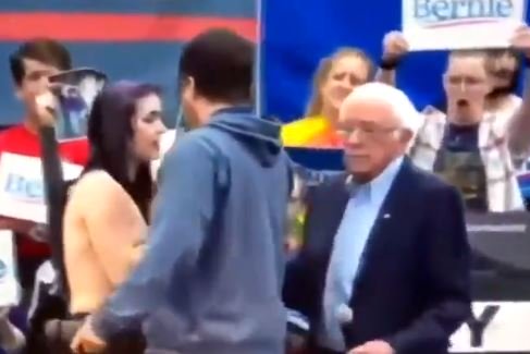 Bernie lets gaggle of naked women take over the stage at rally, flustered Sanders loses control