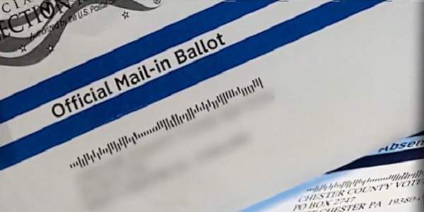 Postal worker caught trying to flee U.S. with absentee ballots