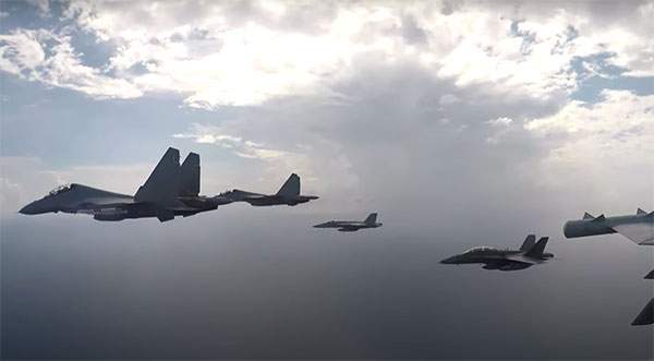 WATCH: U.S. Navy, Royal Malaysian Air Force Conduct Joint Exercise Over South China Sea