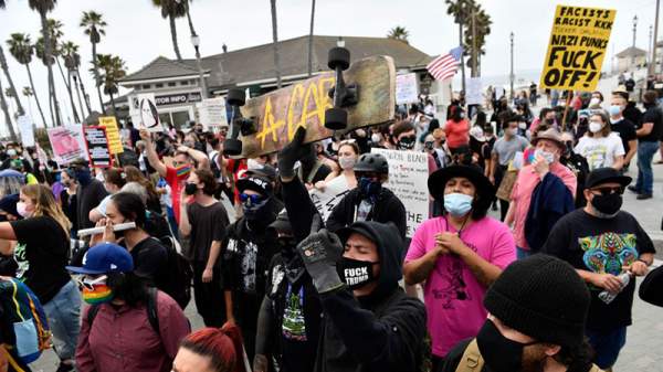 “Total Chaos” – Unlawful Assembly Declared In Huntington Beach When “White Lives Matter” Clashed With Counter-Protesters