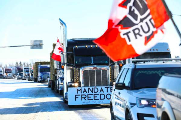 WATCH: Emotions Run High As Canadians Line Highways To Cheer On Massive #TruckersForFreedom Convoy Protesting Fascist Vaccine Mandates