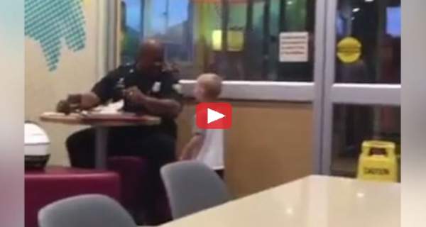 Watch As Kid Spots Cop Eating Alone In Diner, Walks Up And Gives Him Something He'll NEVER Forget