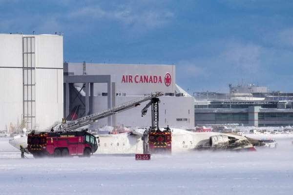 All 80 Aboard Survive After Plane Flips Upside Down During Landing at Toronto Pearson Airport | The Epoch Times