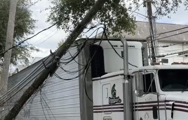 Trucking & power company both shirking responsibility for low-hanging power lines dragged down by semi truck